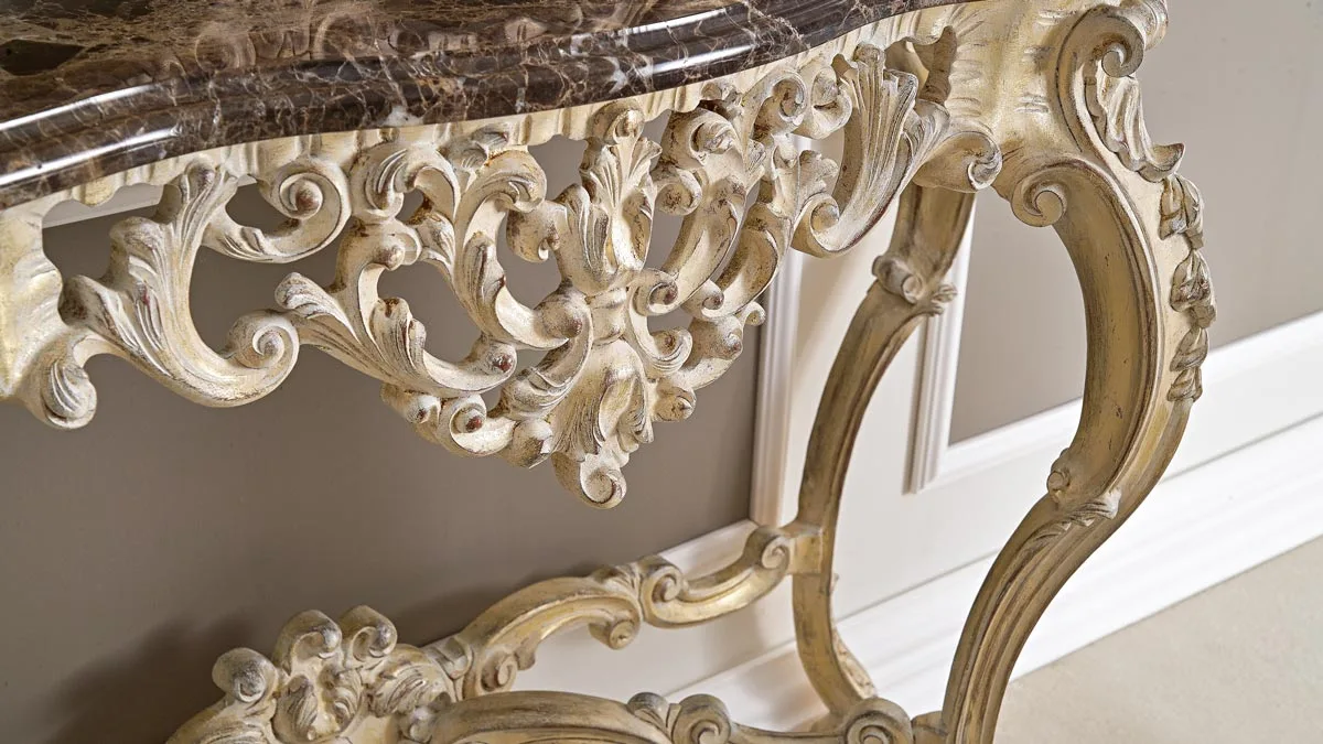 Detail of a carved Baroque console with marble top