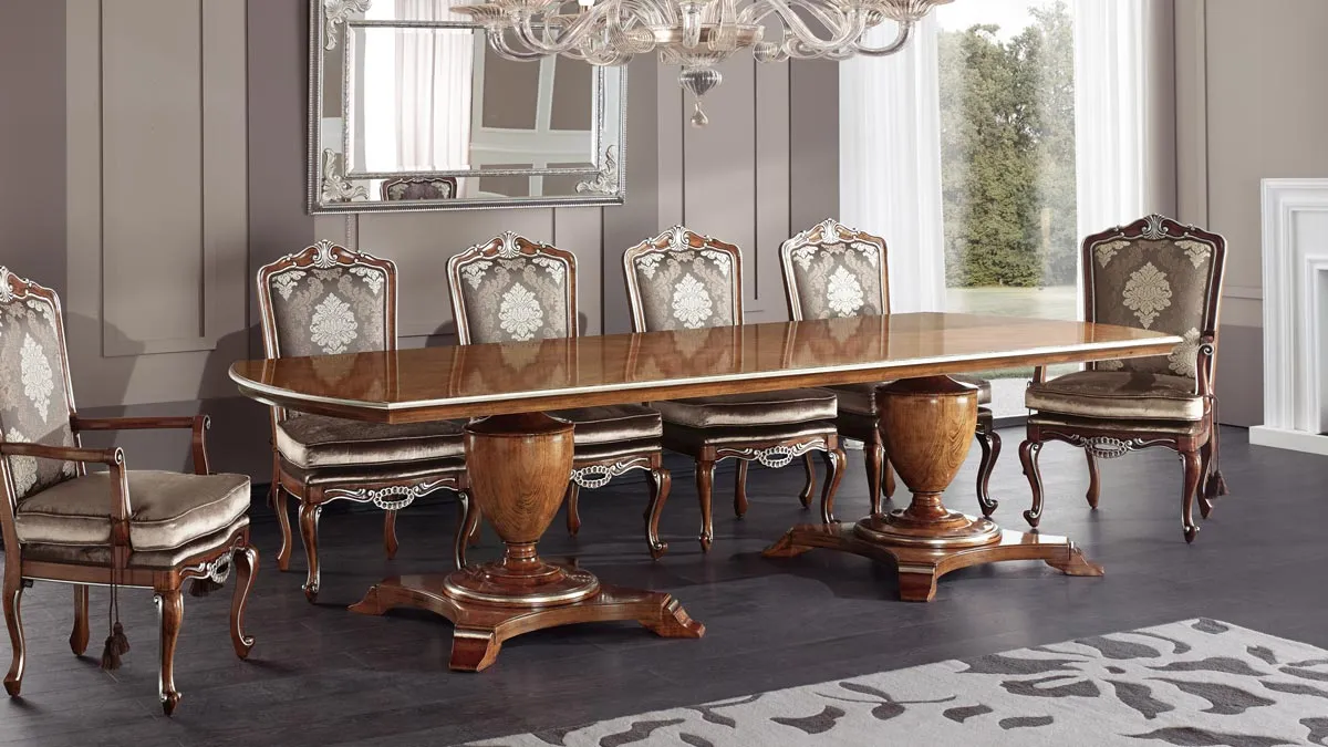 Classic baroque style furniture set consisting of a wooden table and six chairs