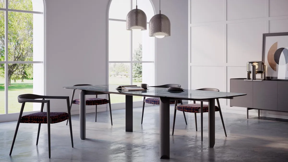 A contemporary-style dining room consisting of a table, chairs and sideboard created by designer Paolo Cappello